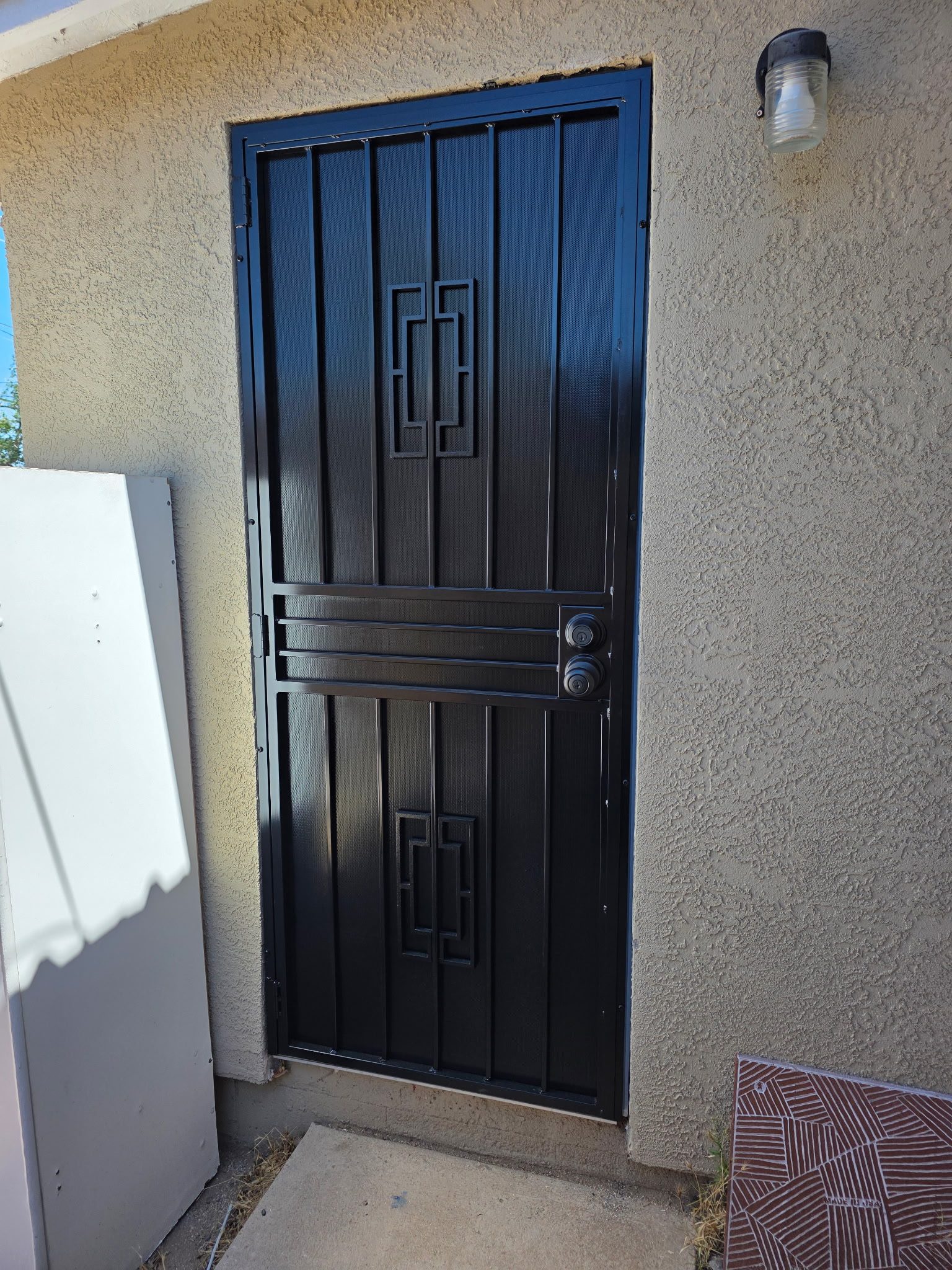 Black Geometric Security Door