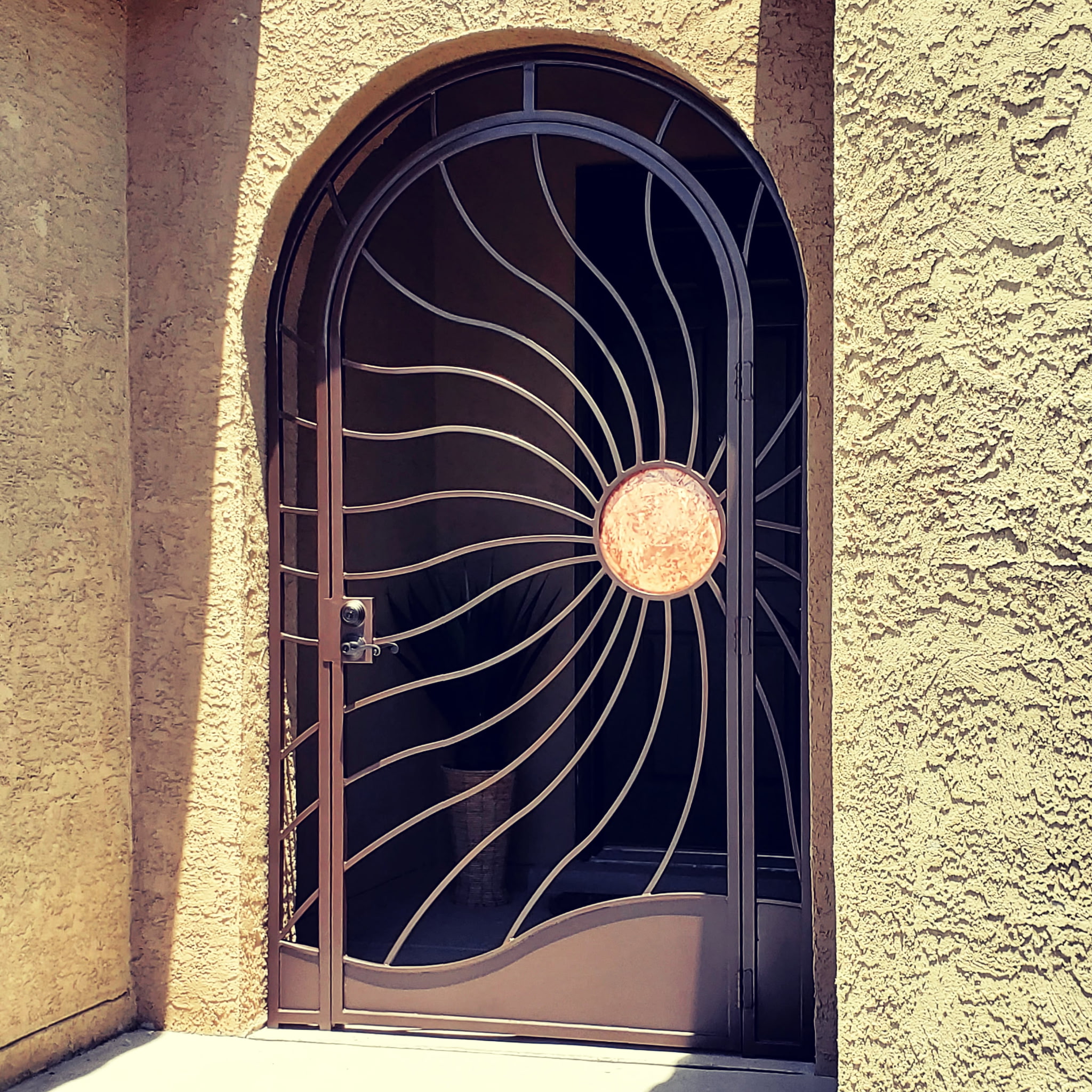 Sunburst Iron Door